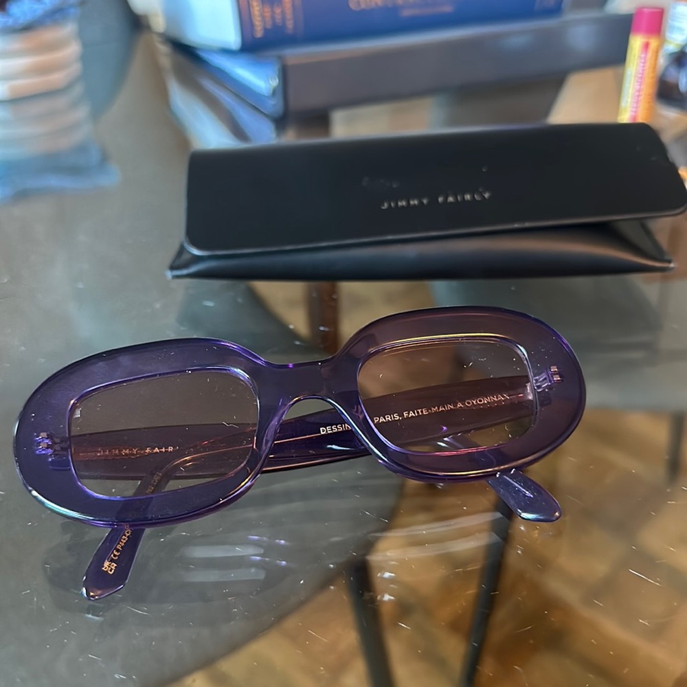 Jimmy Fairly purple glasses